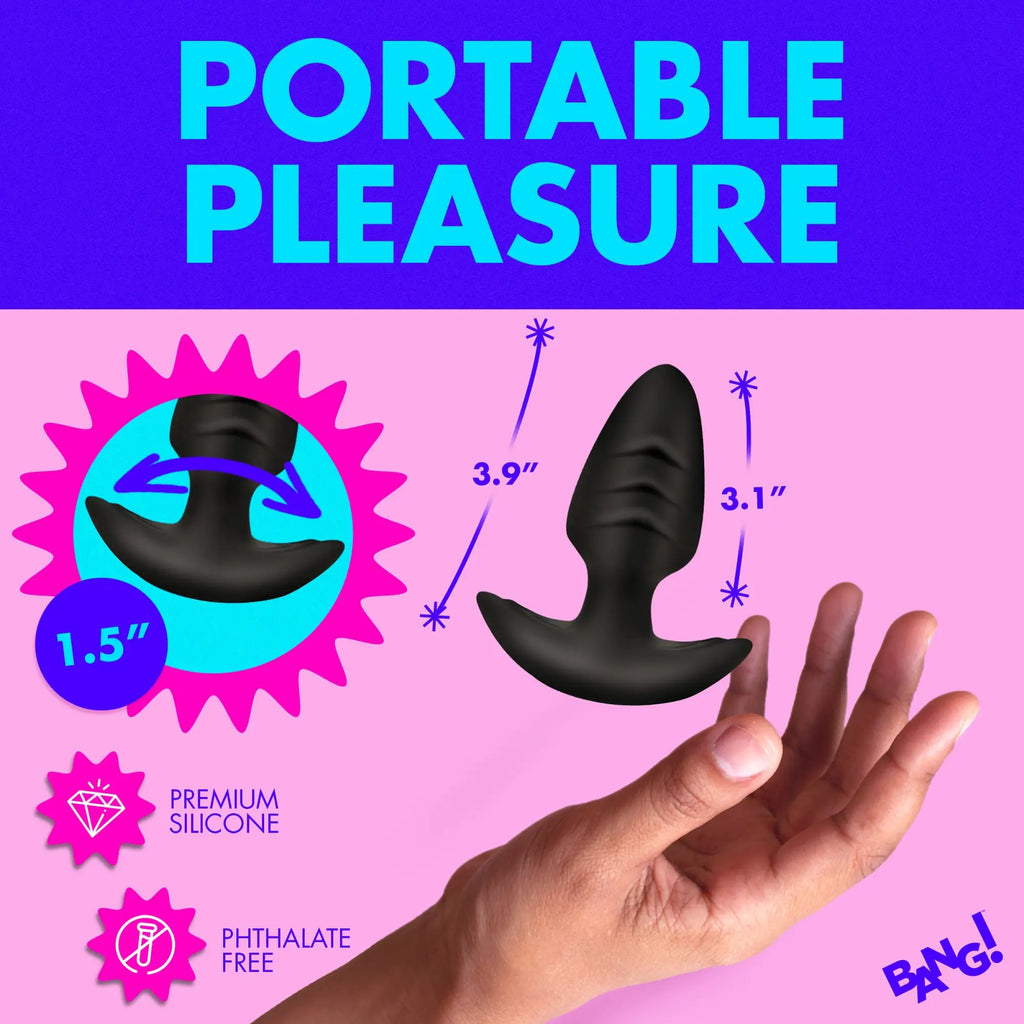 Bang Rotating and Vibrating Silicone Butt Plug in black, shown with dimensions, held over a pink background.