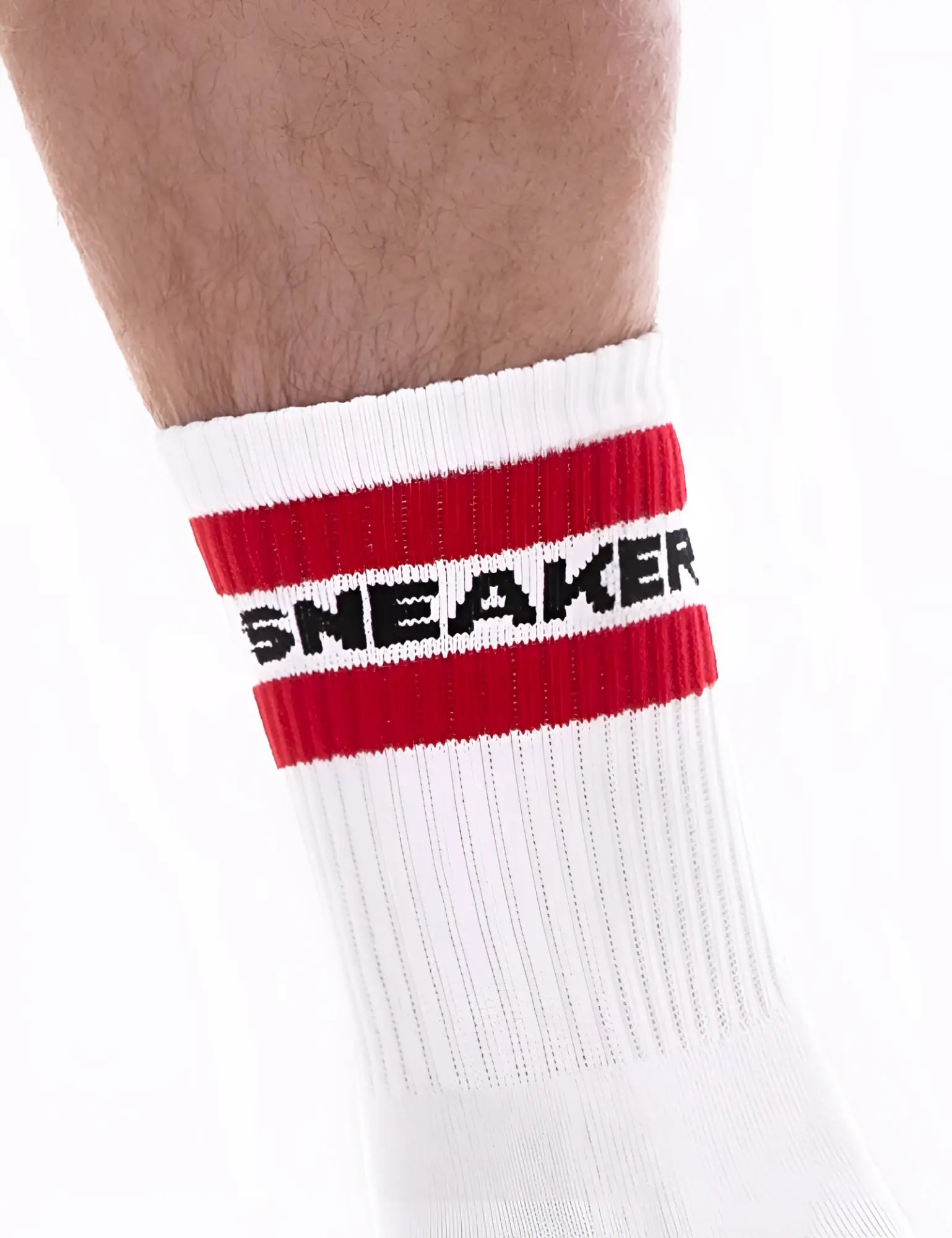 White athletic sneaker half socks by barcode berlin with bold red stripe and black sneaker lettering cuff size s/m