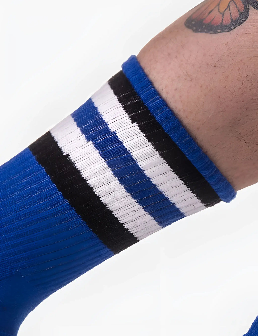 Blue athletic half sock with bold black and white stripes near the cuff from Barcode Berlin in size L XL
