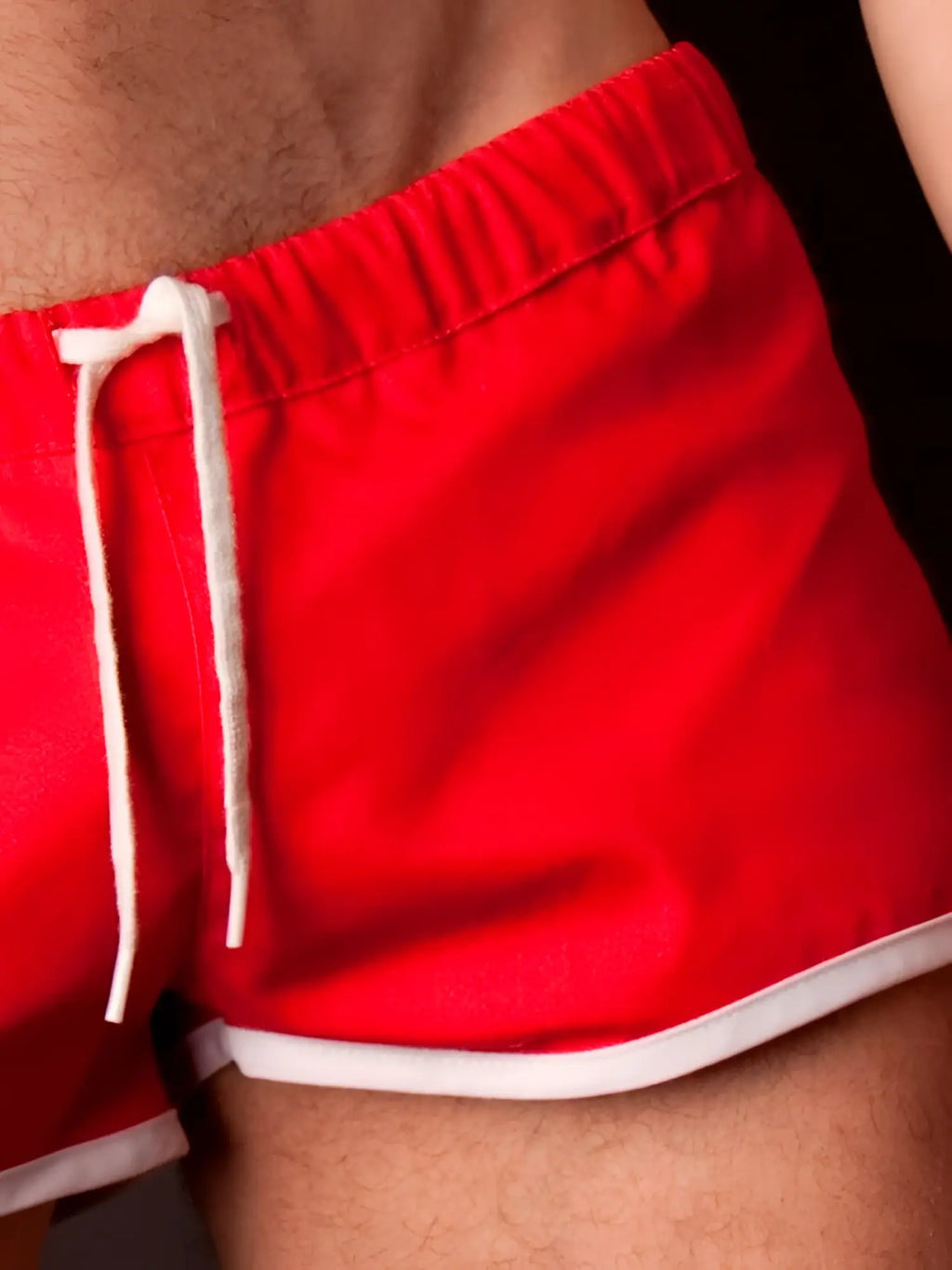 Bright red Barcode Berlin gym shorts with white drawstrings and trim in size S/M for activewear use