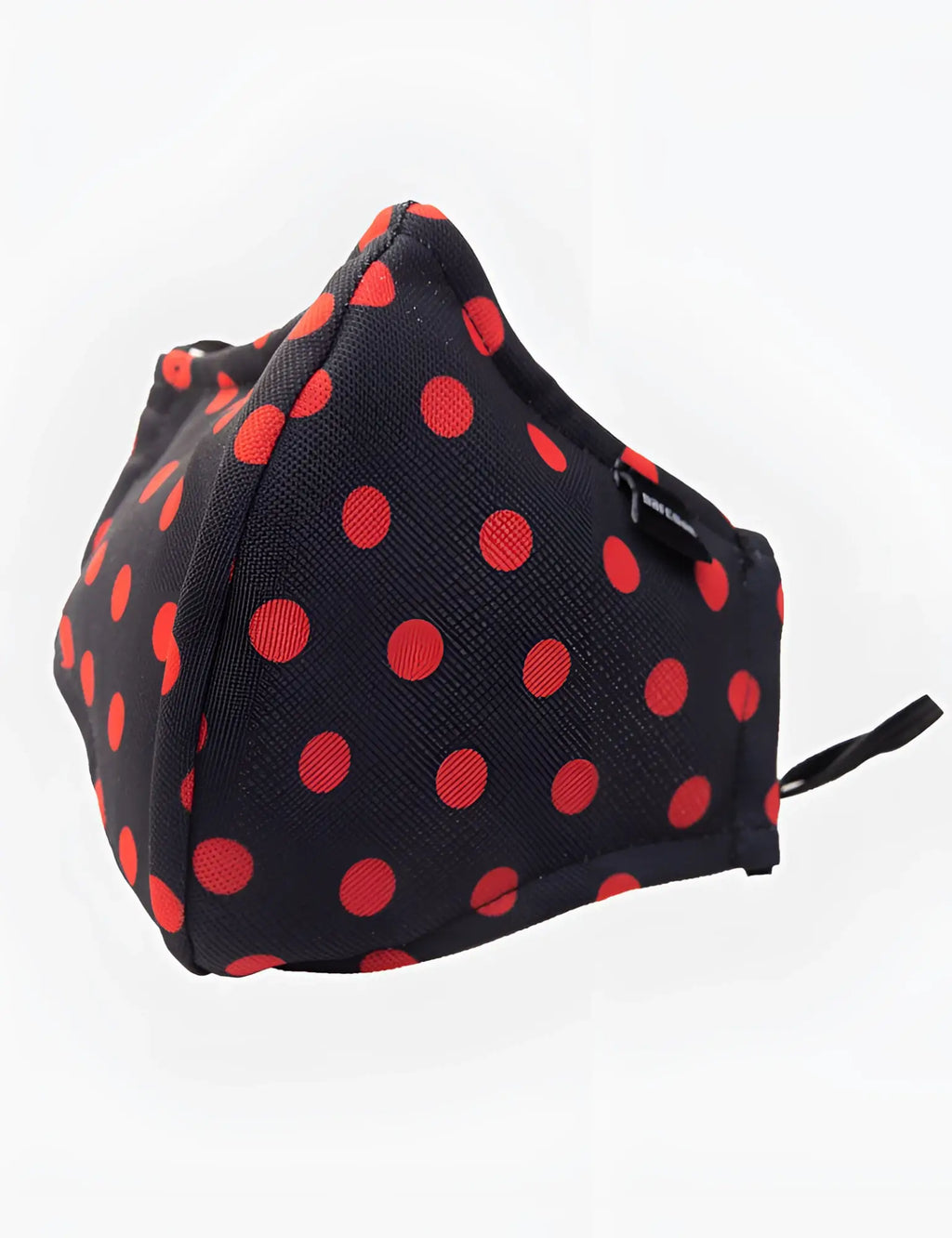 Black fabric face mask with bold red polka dots and a small black zipper barcode berlin unisex size one size