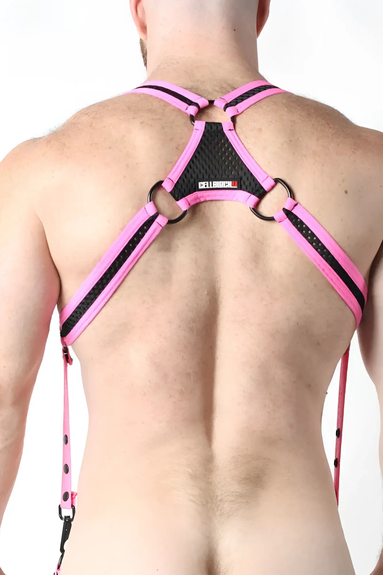 Pink and black mesh harness with adjustable straps and metal rings from bare mesh 2.0 collection