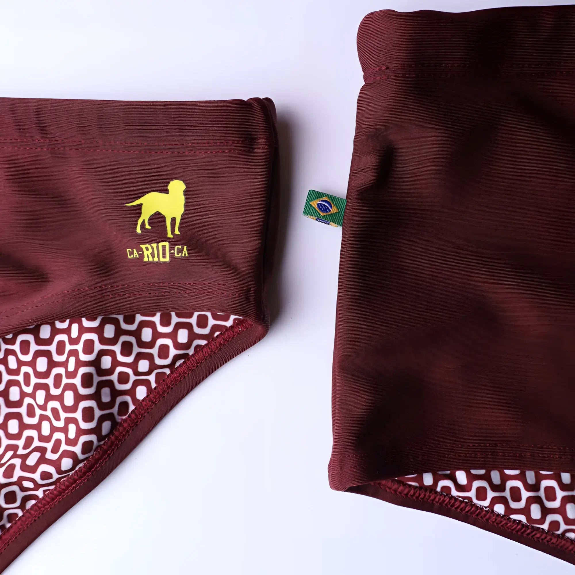 Maroon corduroy mens swimming sunga with yellow dog silhouette ca-rio-ca embroidery and white geometric inner lining