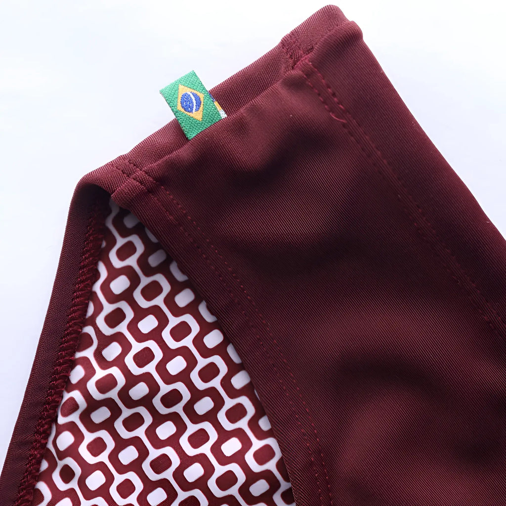 Barolo burgundy solids men’s swimming sunga in maroon cotton with white geometric lining and green Brazilian flag tag