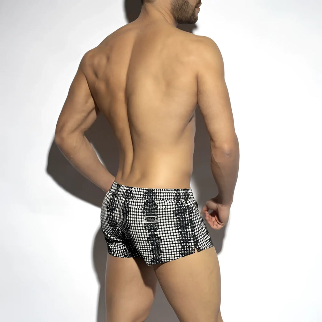 Black and white checkered baroque squared swim shorts with a bold geometric pattern ideal for beachwear