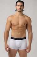 White adam smith basic boxer trunks with black elastic waistband featuring brand name in white lettering