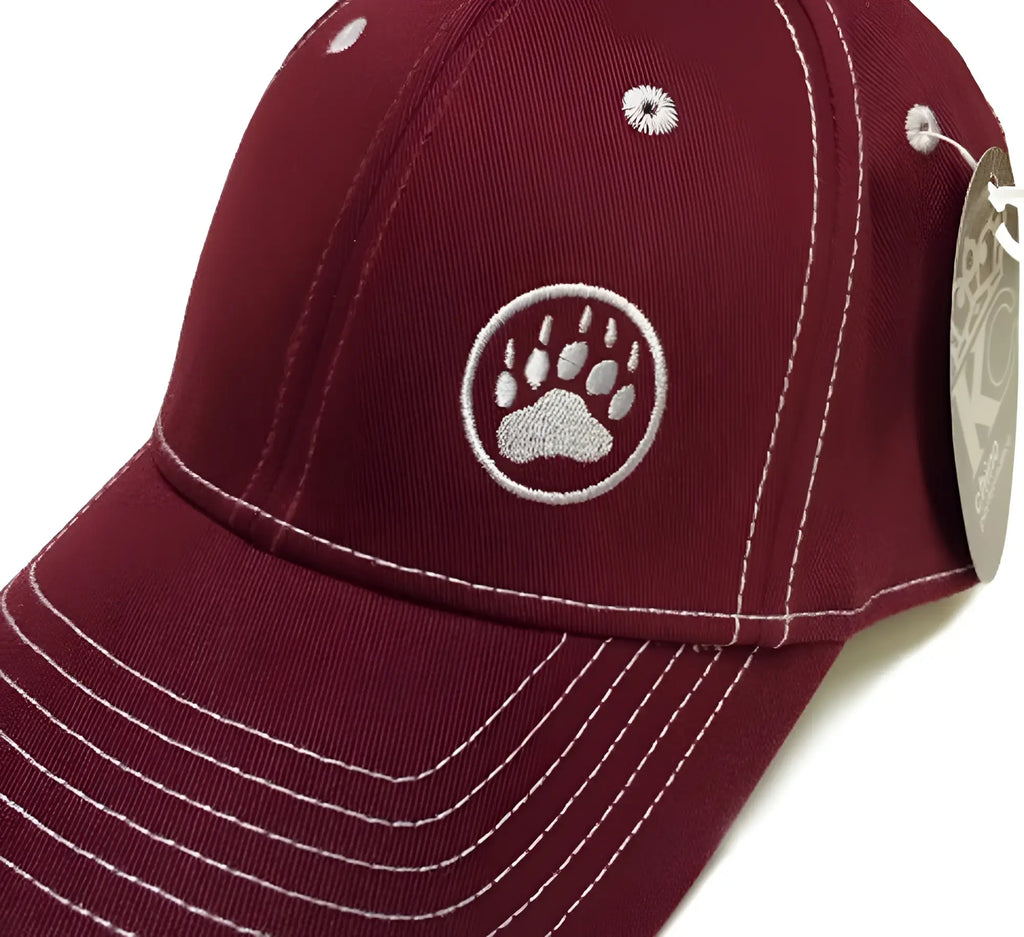 Maroon bear paw logo cap with white embroidered paw print and matching stitching for casual outdoor wear
