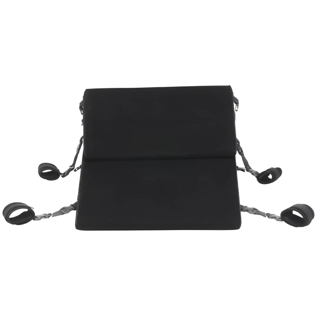 Bedroom Bliss Bondage Cushion Set: A black, wedge-shaped foam cushion featuring four adjustable straps with wrist cuffs.
