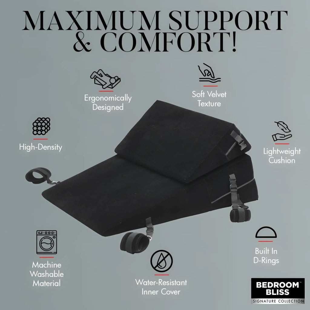 Bedroom Bliss Bondage Cushion Set: A black velvet wedge pillow with adjustable straps, D-rings, and comfort features.