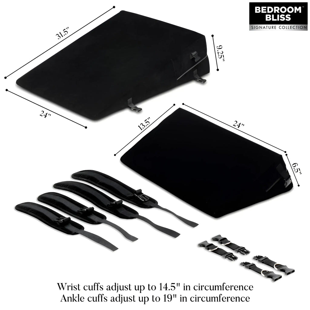 Bedroom Bliss Bondage Cushion Set: Two black wedge pillows with adjustable straps, cuffs, and measurement labels.