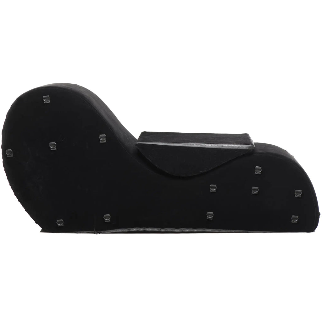 Bedroom Bliss The Bondage Love Couch: A black, velvet, contoured lounge chair featuring built-in metal d-ring anchors.