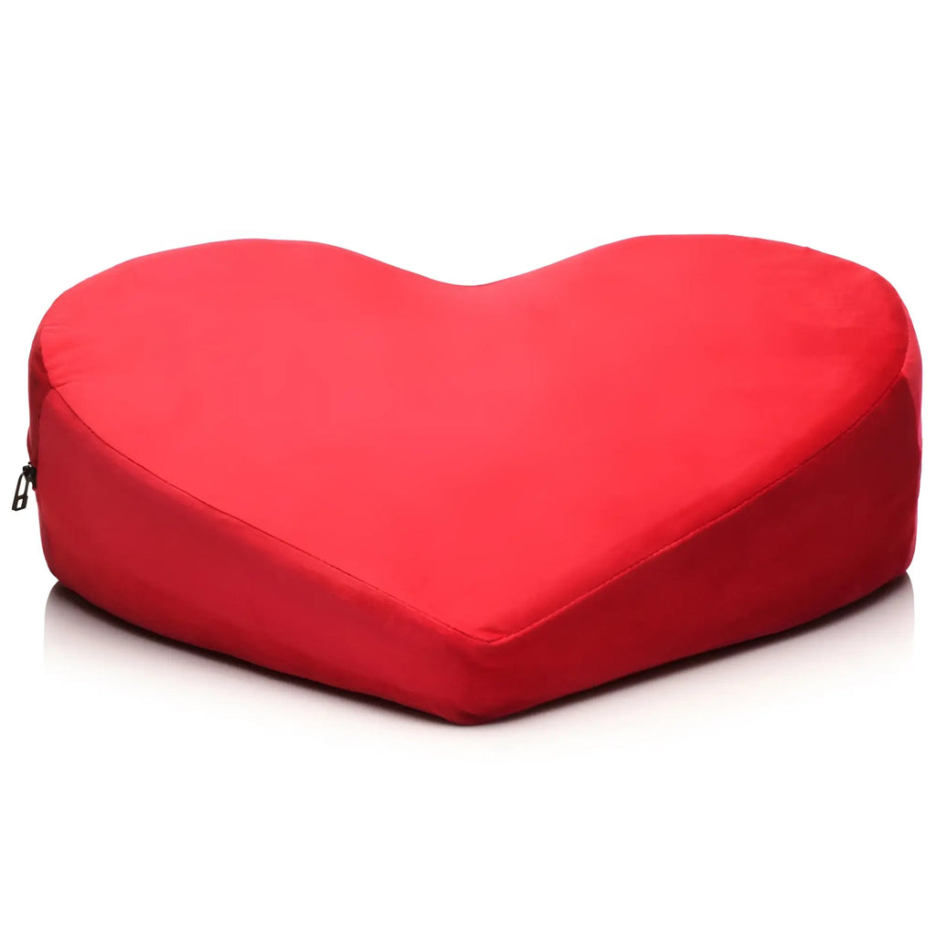Bedroom Bliss The Heart Pillow: A vibrant red, velvet-textured heart-shaped wedge pillow against a white background.