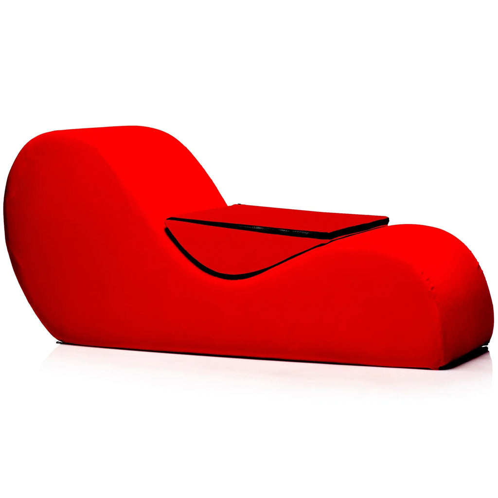 Bedroom Bliss The Love Couch: A vibrant red, ergonomic curved lounge chair with a sleek, modern design.