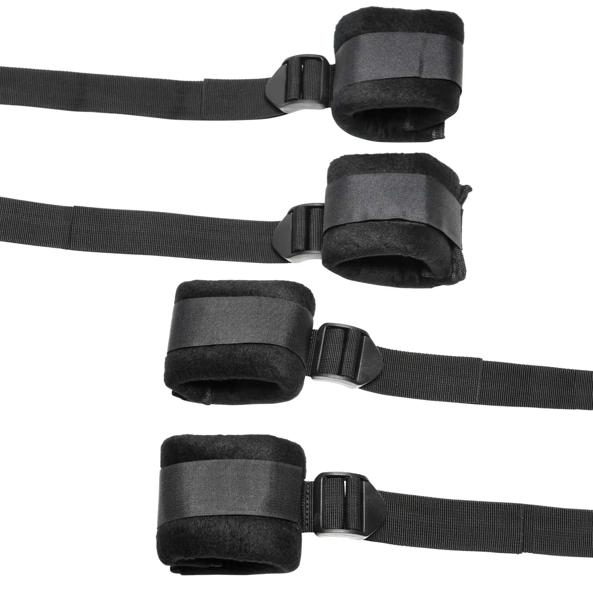 Bedroom Bliss Lover's Bed Restraint System: Four black padded cuffs with adjustable nylon straps and plastic buckles.