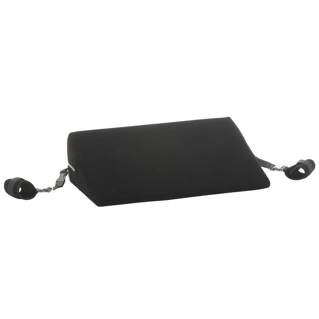 Bedroom Bliss Small Bondage Cushion: A black, wedge-shaped foam cushion with adjustable attached wrist restraints.