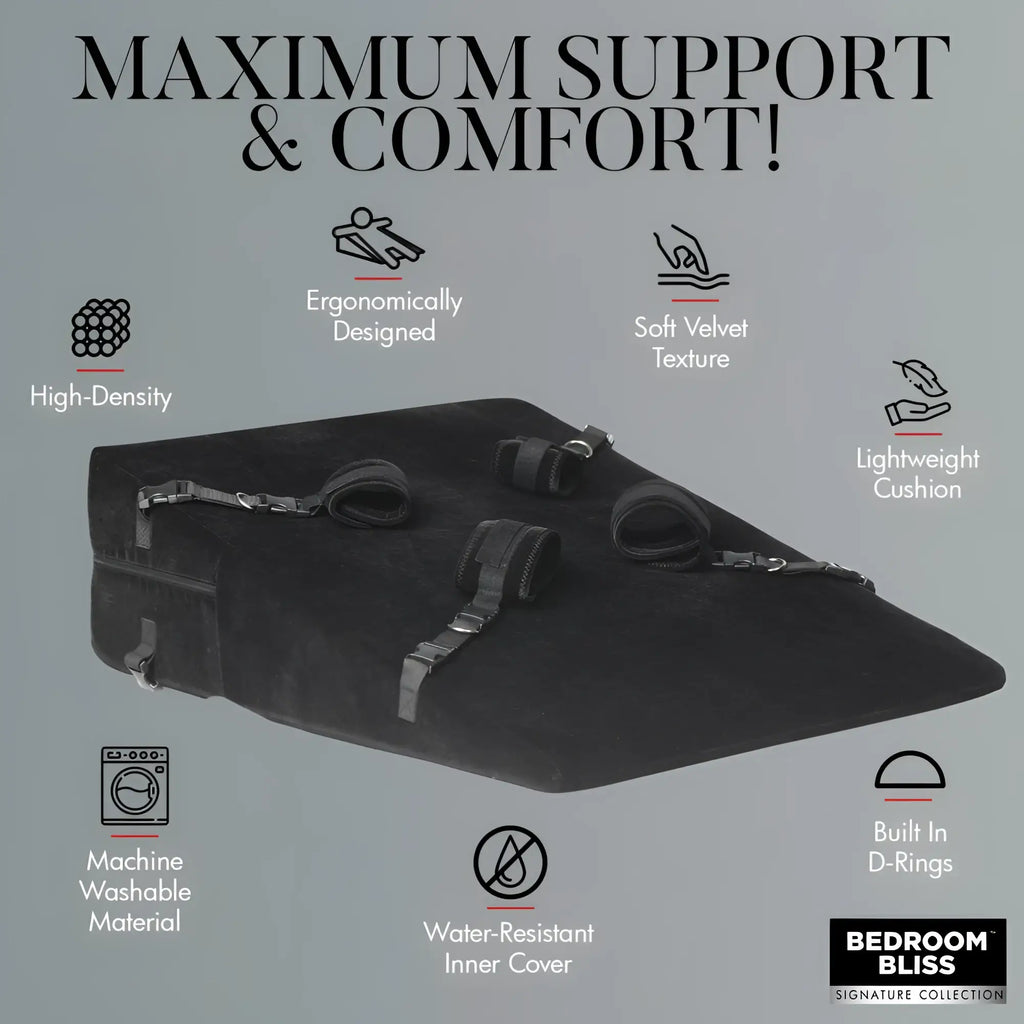 Bedroom Bliss XL black velvet bondage cushion with adjustable straps and D-rings, surrounded by feature icons.