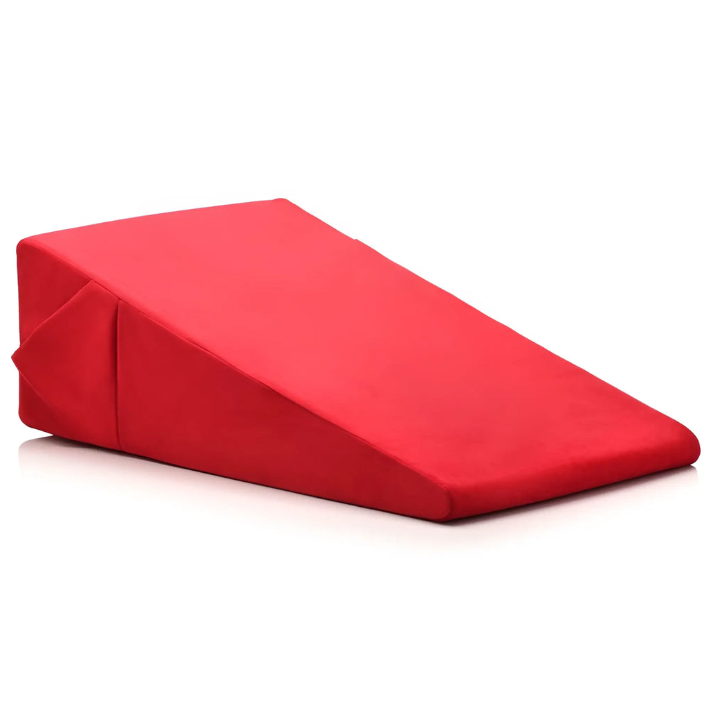 Bedroom Bliss XL Love Cushion: A red, wedge-shaped foam support pillow with a smooth, soft-touch fabric finish.