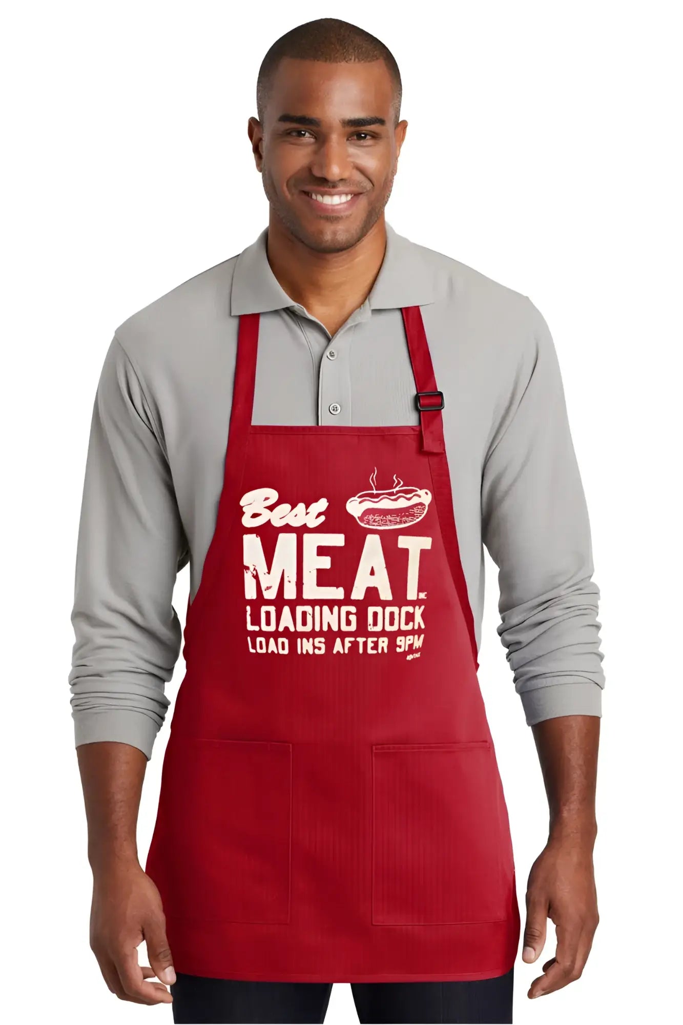 Red best meat apron made of durable fabric with two front pockets white text and hot dog graphic design
