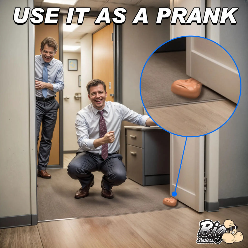 Two laughing men in an office with a Big Ballers Big Balls door stop, a tan-colored, testicle-shaped novelty wedge.