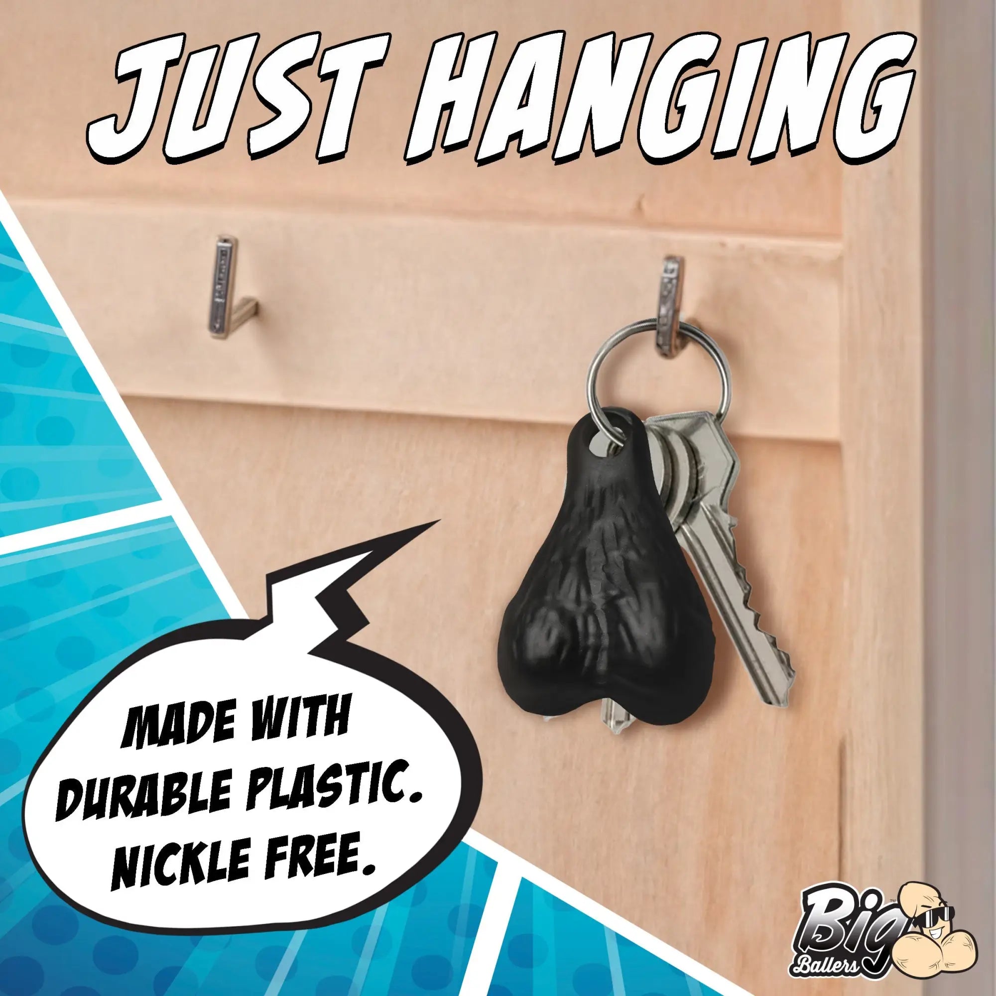 Big Ballers keychain: A black, realistic, testicle-shaped charm hanging on a key ring with metal keys.