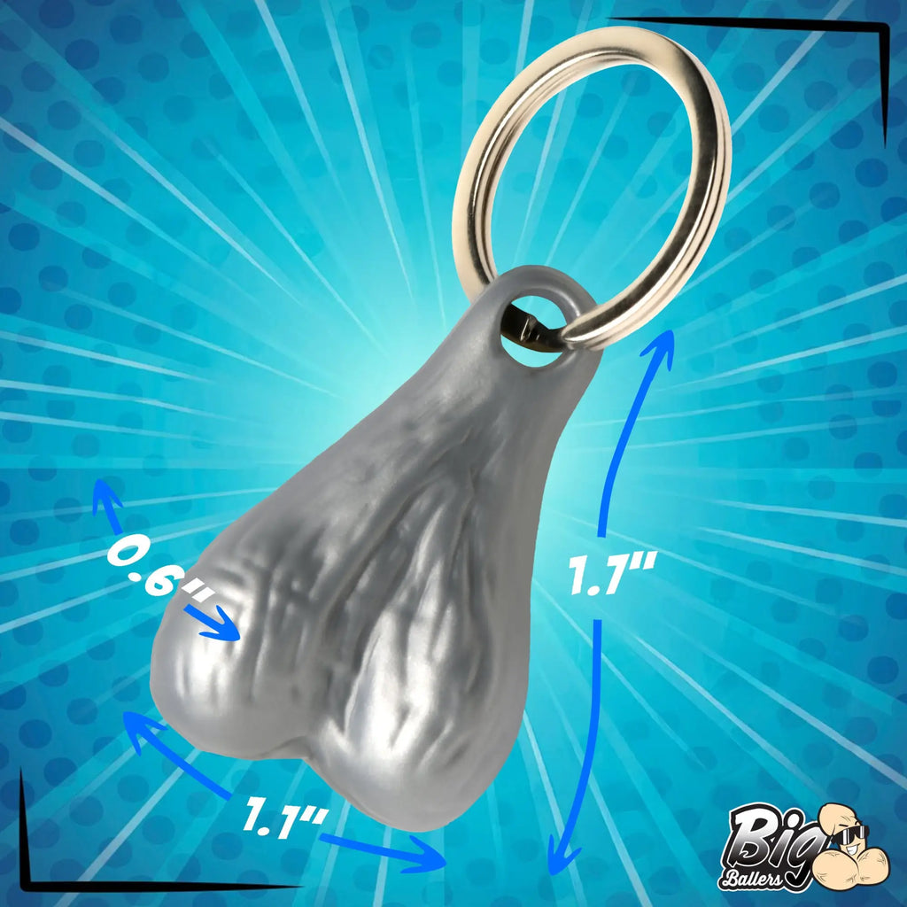 Big Ballers keychain: a silver-toned, testicle-shaped pendant on a metal ring, showing dimensions on a blue background.