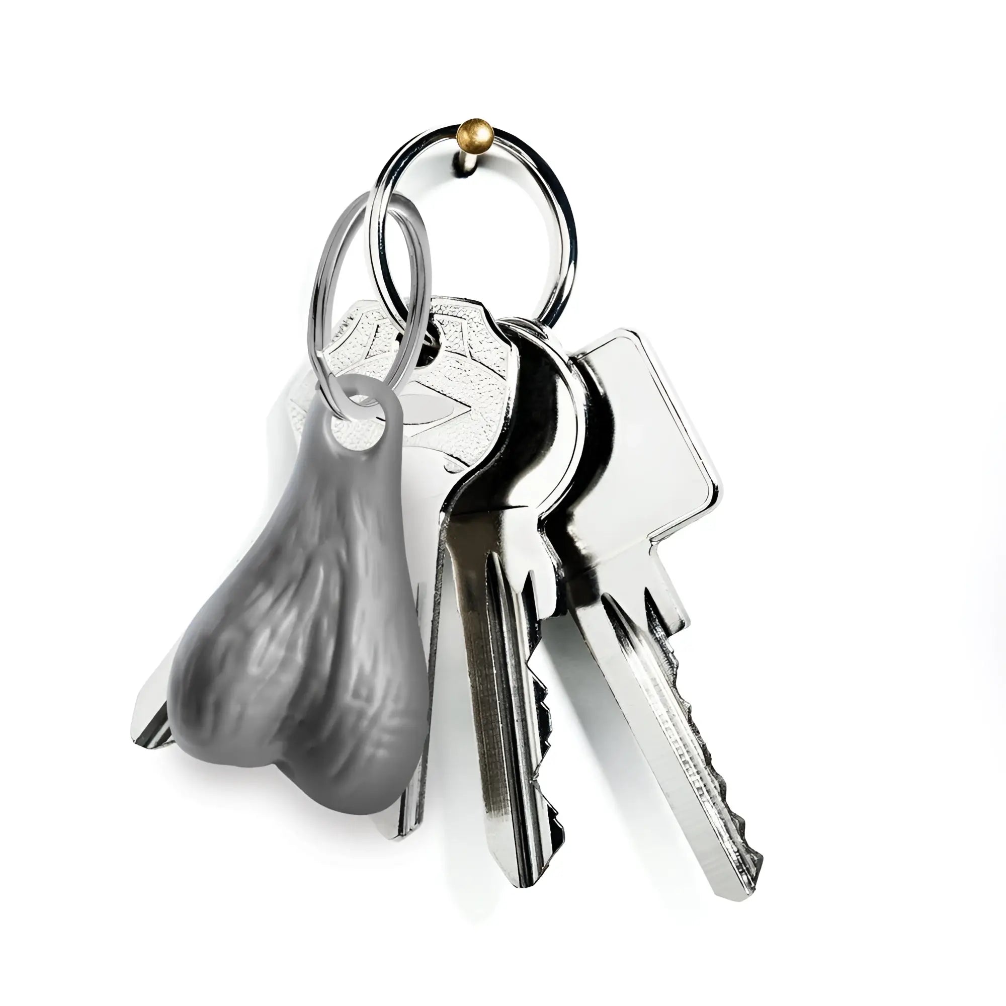 Big Ballers keychain: A grey, textured, anatomical-style pendant hanging on a metal keyring with two silver keys.
