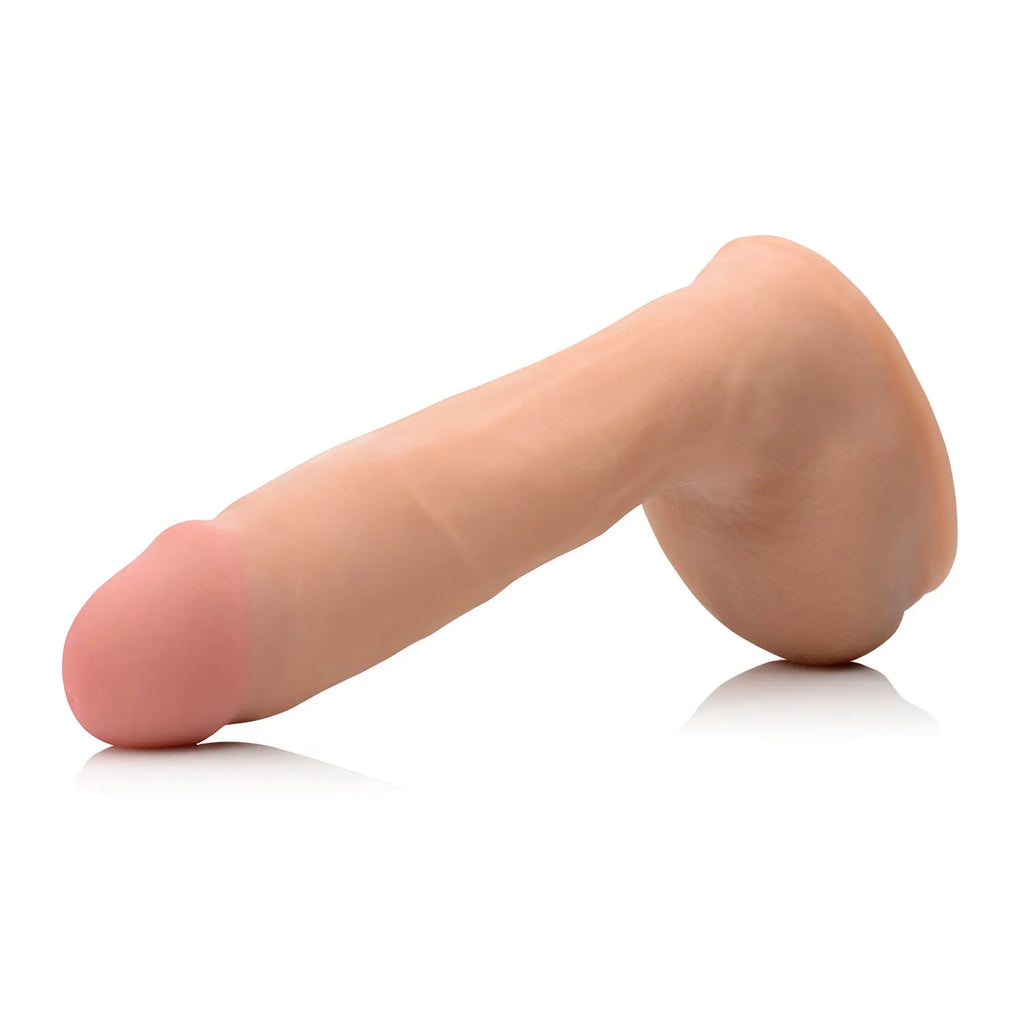 Big Shots 8.5-inch dual-density squirting dildo in a realistic tan flesh tone with a soft pink head.