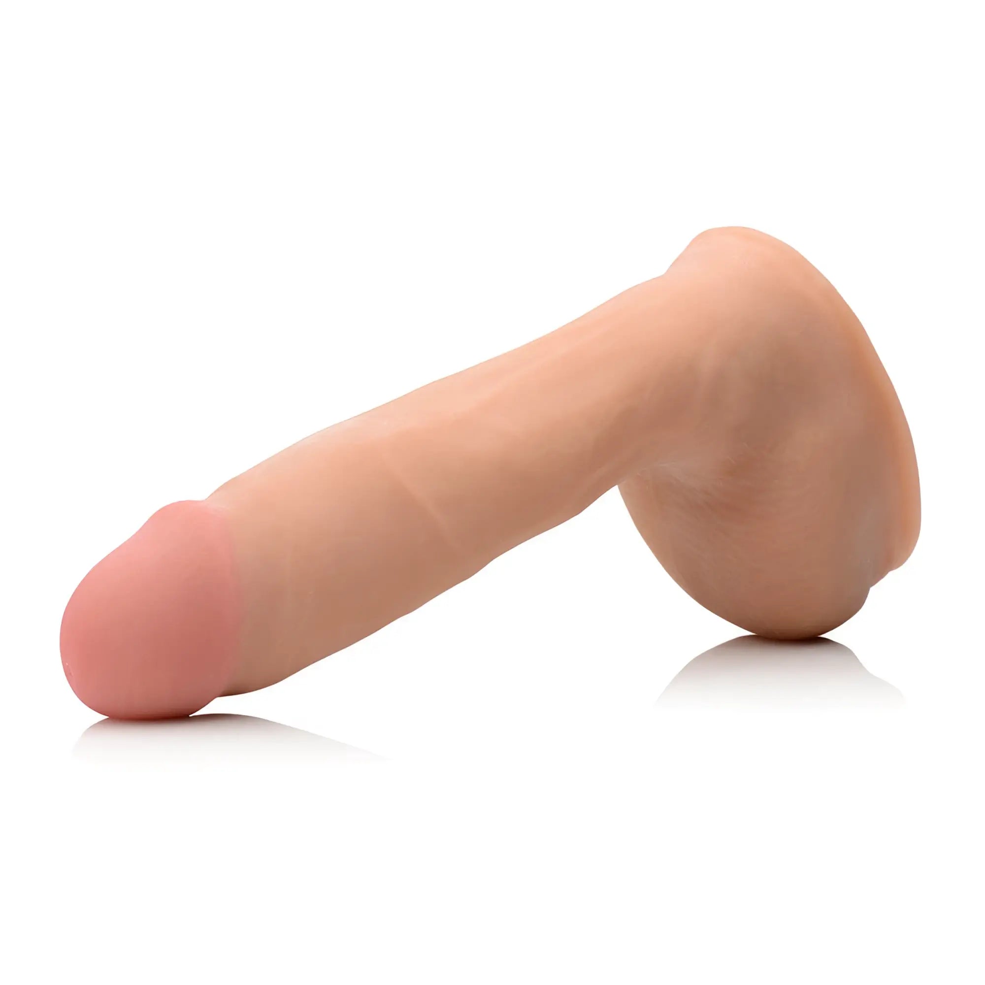Big Shots 8.5-inch dual-density squirting dildo in a realistic tan flesh tone with a soft pink head.