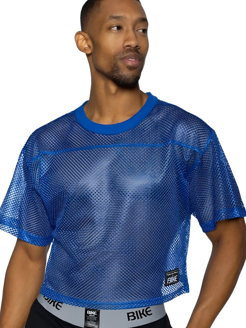 Blue mesh crop top with solid blue ribbed neckline and hem featuring bike logo on lower right side for athletic use