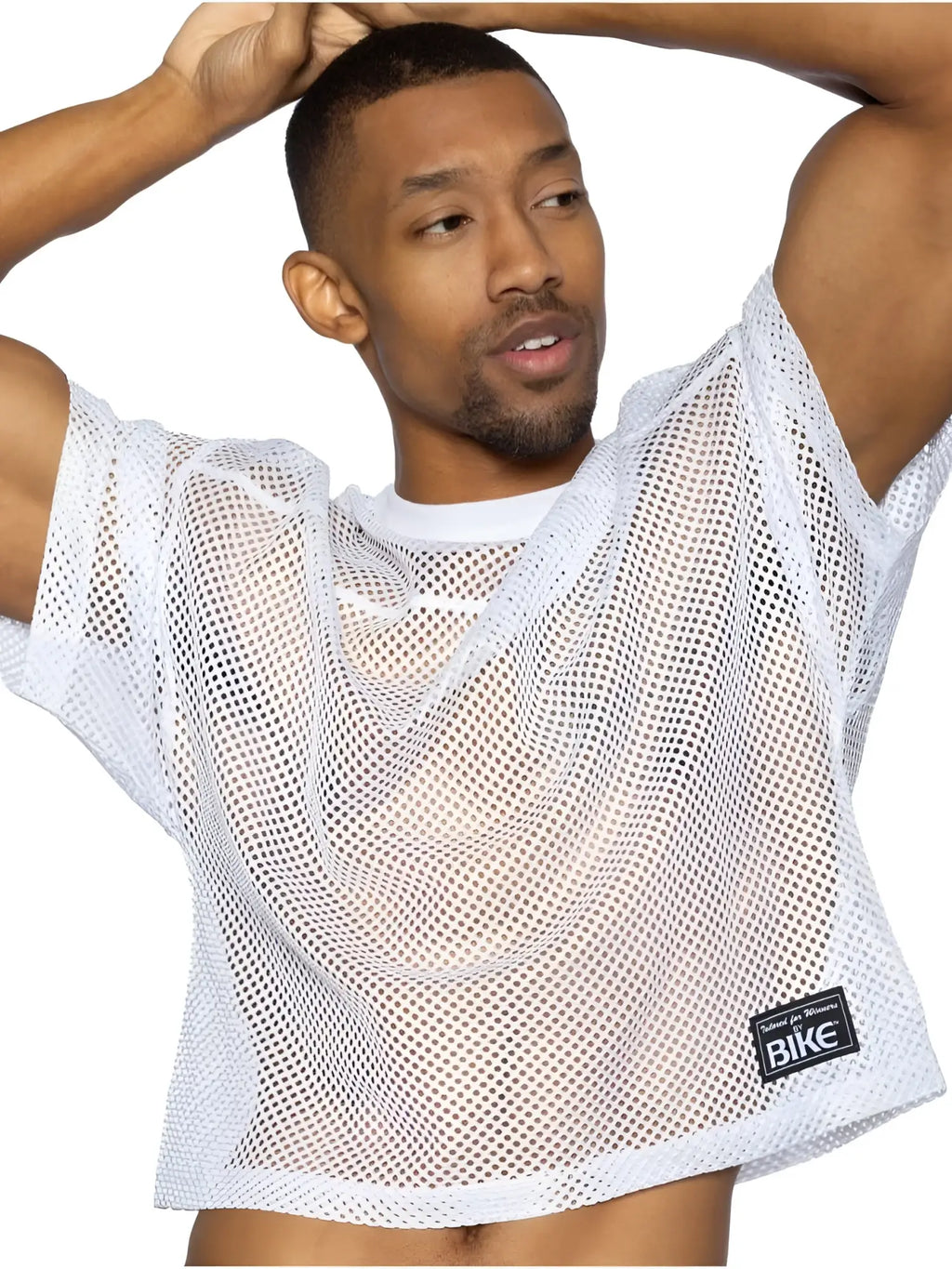 White mesh crop top with black bike label on lower right side from BIKE athletic BAM134 short sleeve practice jersey
