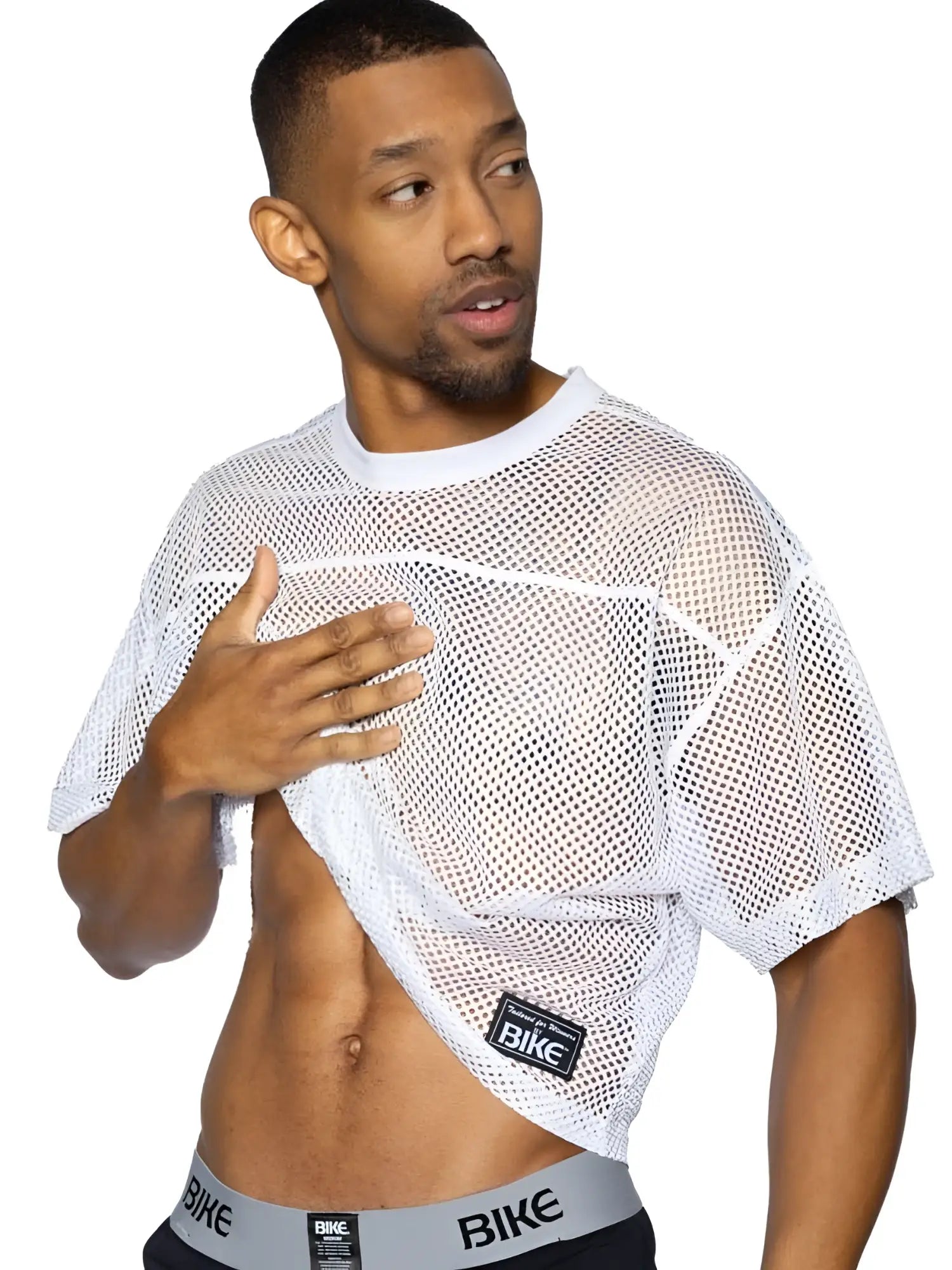 White mesh crop top with black bike logo patch on lower left side from bike athletic bam134 short sleeve practice jersey
