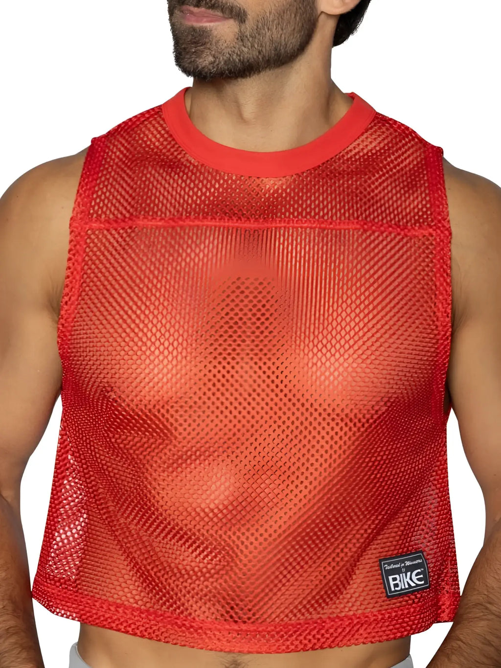 Red mesh crop top with solid red ribbed neckline and hem featuring small black bike brand patch on lower right side