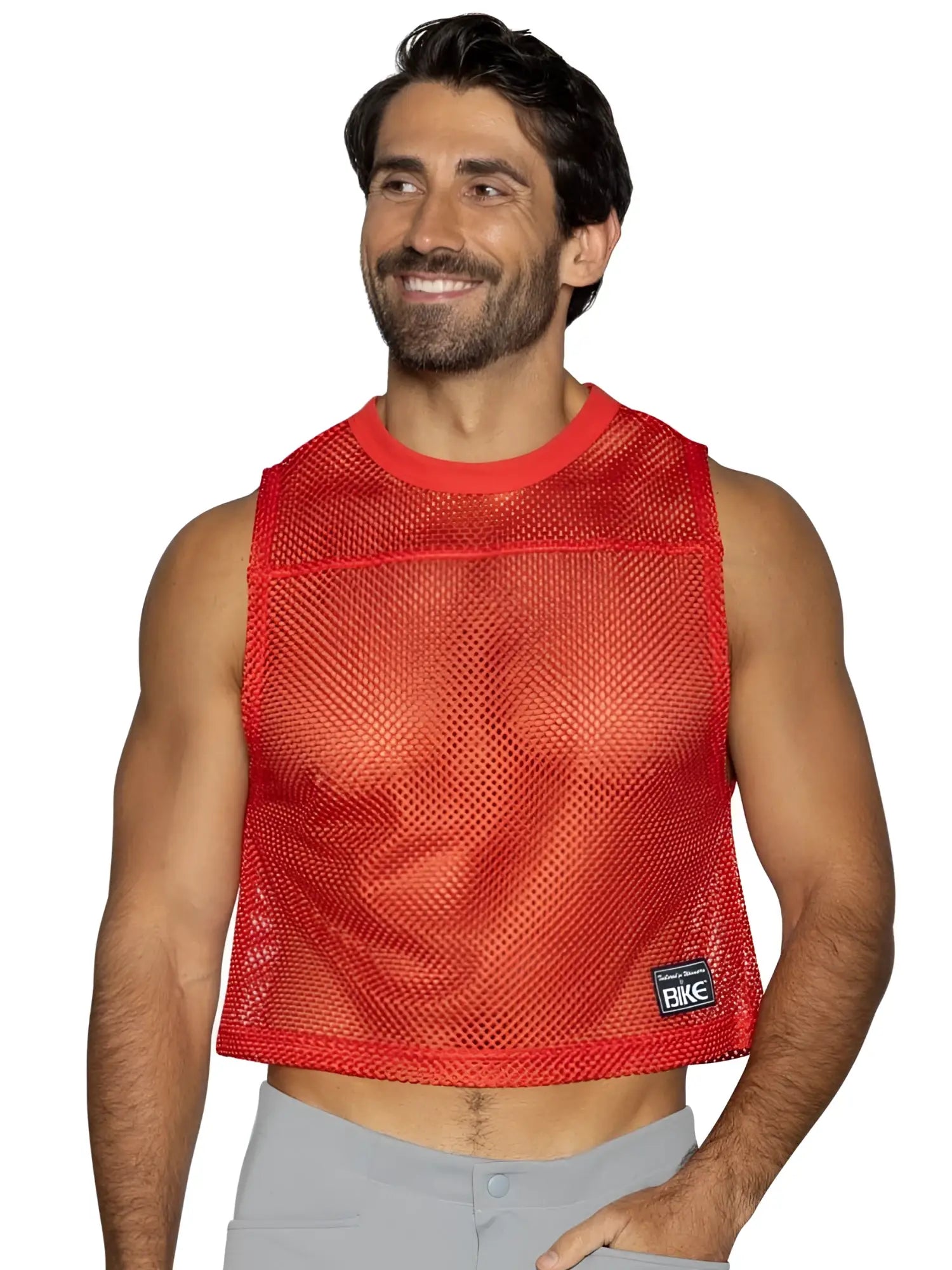 Red mesh sleeveless practice jersey with ribbed neckline and hem featuring black brand tag by bike athletic