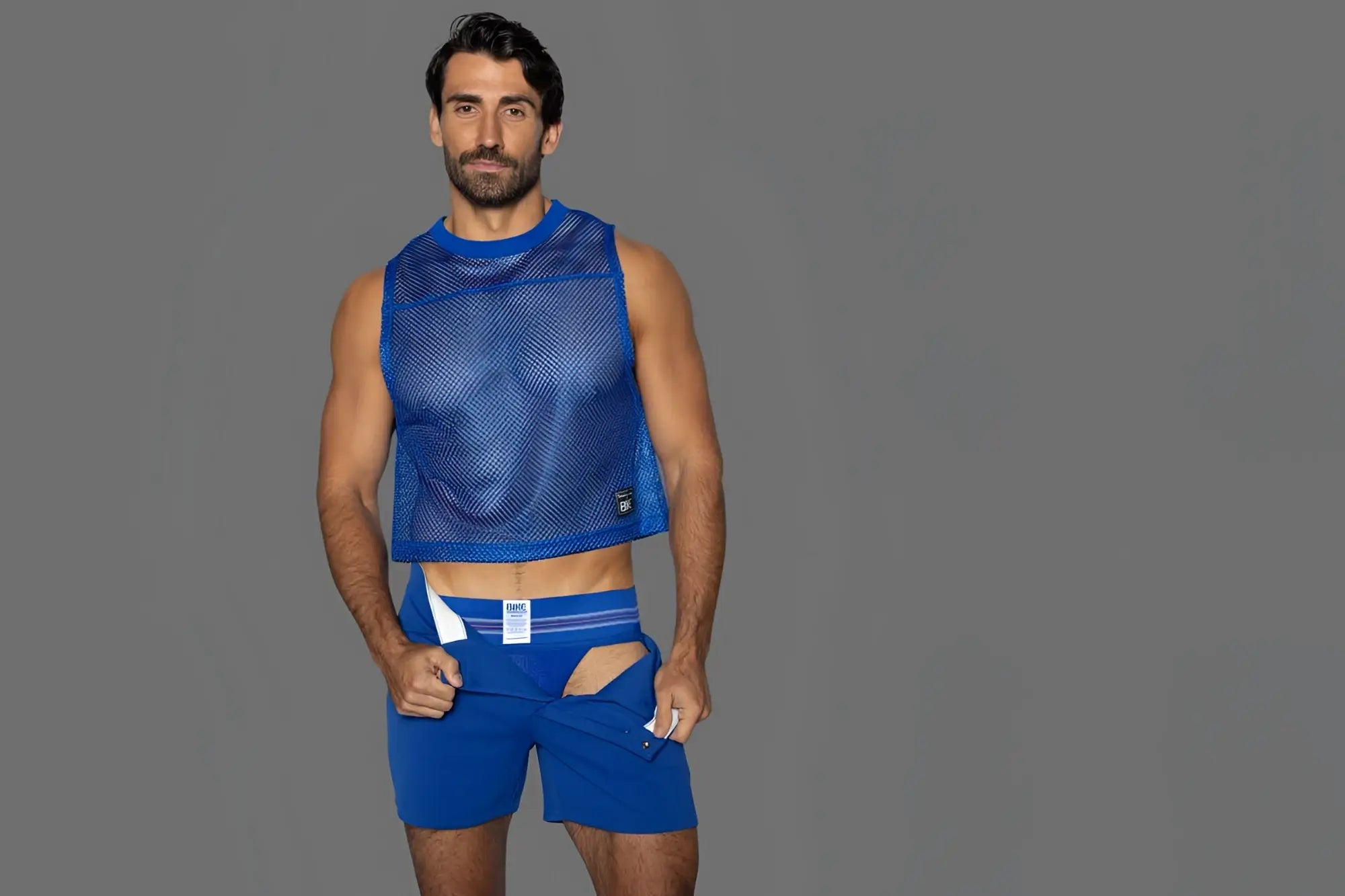 Blue mesh sleeveless practice jersey by bike athletic in vibrant royal blue with cropped hem and subtle lower left branding