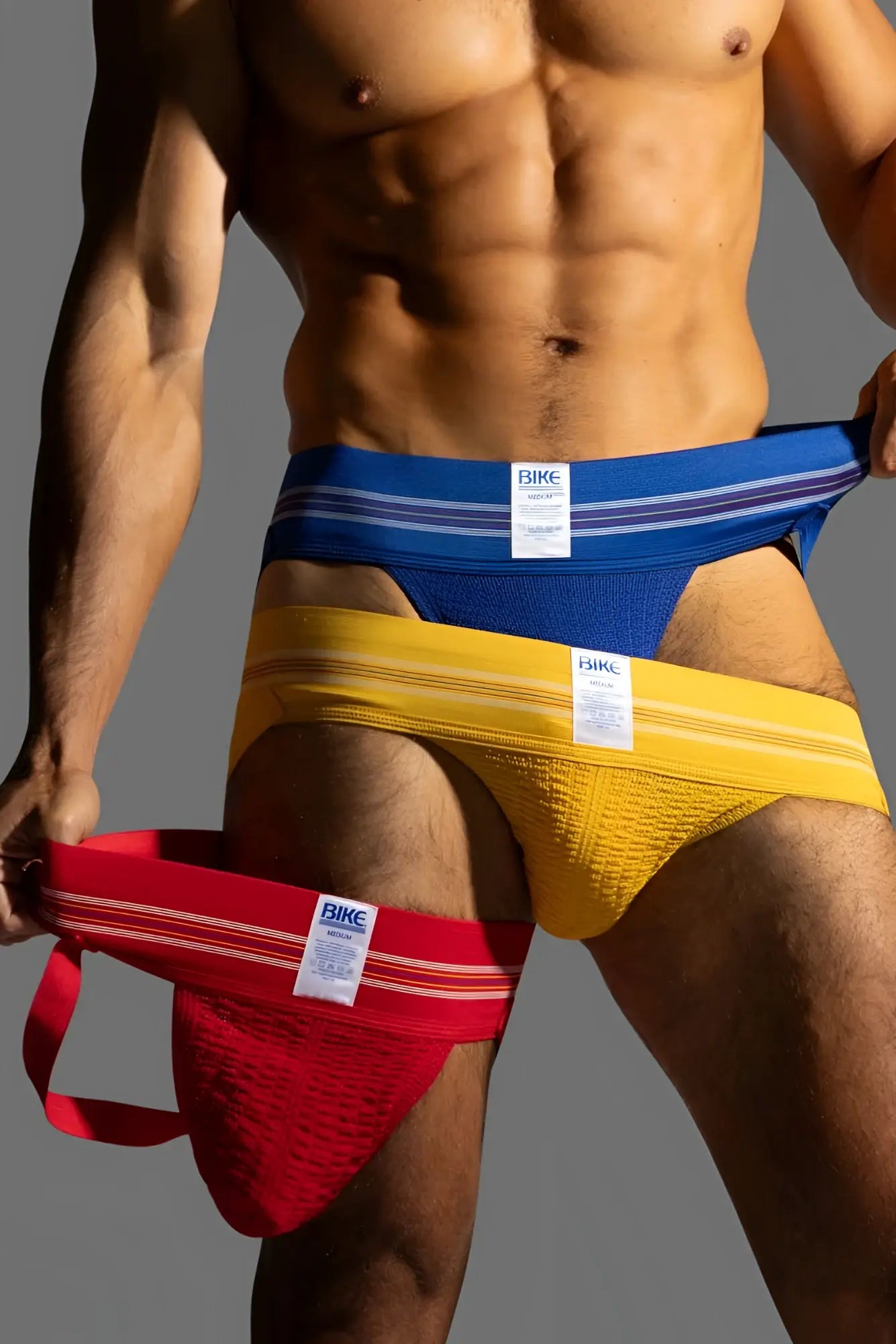 Bike athletic bas306 original number 10 jockstrap in royal with blue yellow and red textured briefs and striped waistband