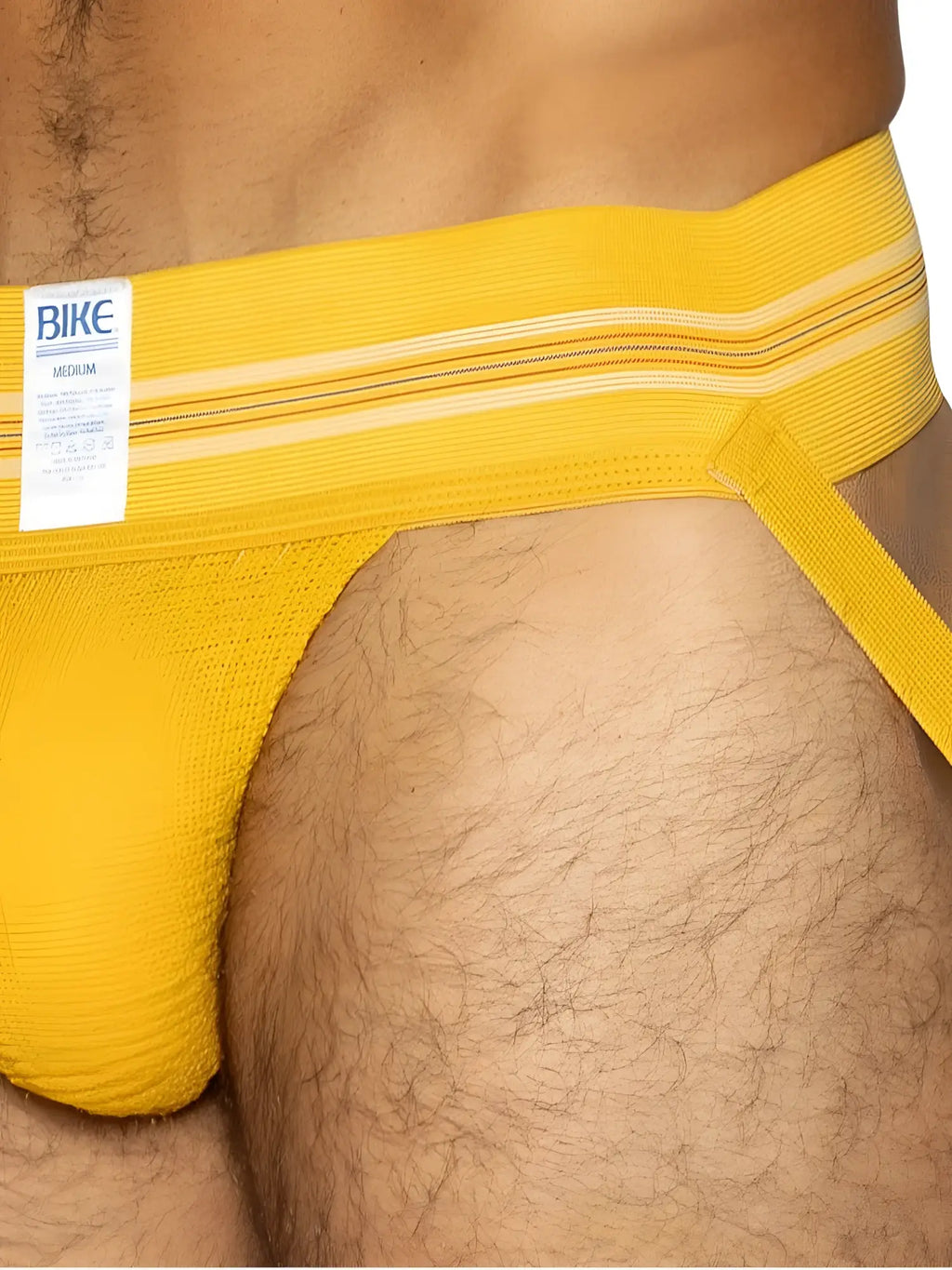 Bright yellow BIKE athletic BAS306 jockstrap briefs with textured fabric and white striped waistband in yellow