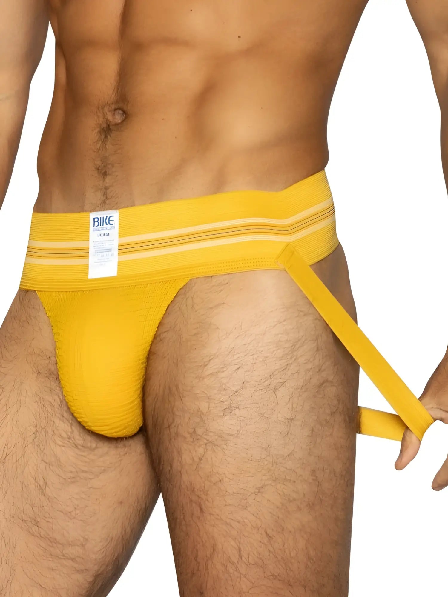 Bright yellow textured fabric bike brief with white bike label on waistband for athletic use