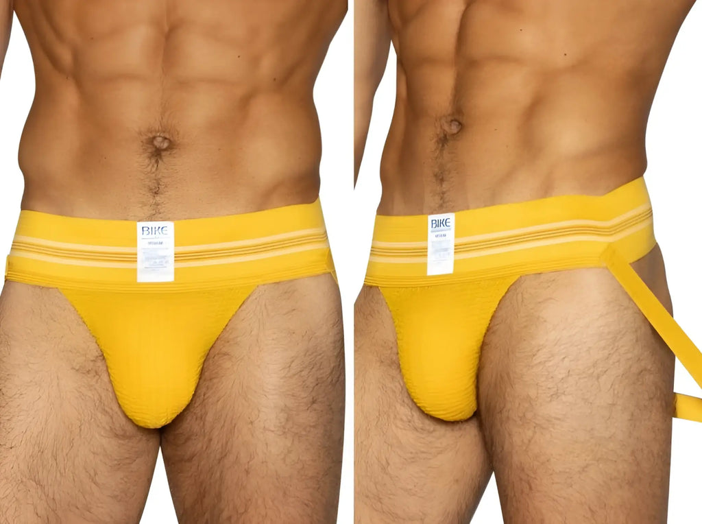 Bright yellow BIKE athletic briefs with white stripes and branded tag designed for sports and active wear