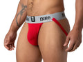 Red bike classic jockstrap with gray waistband and black logo designed for athletic support and comfort