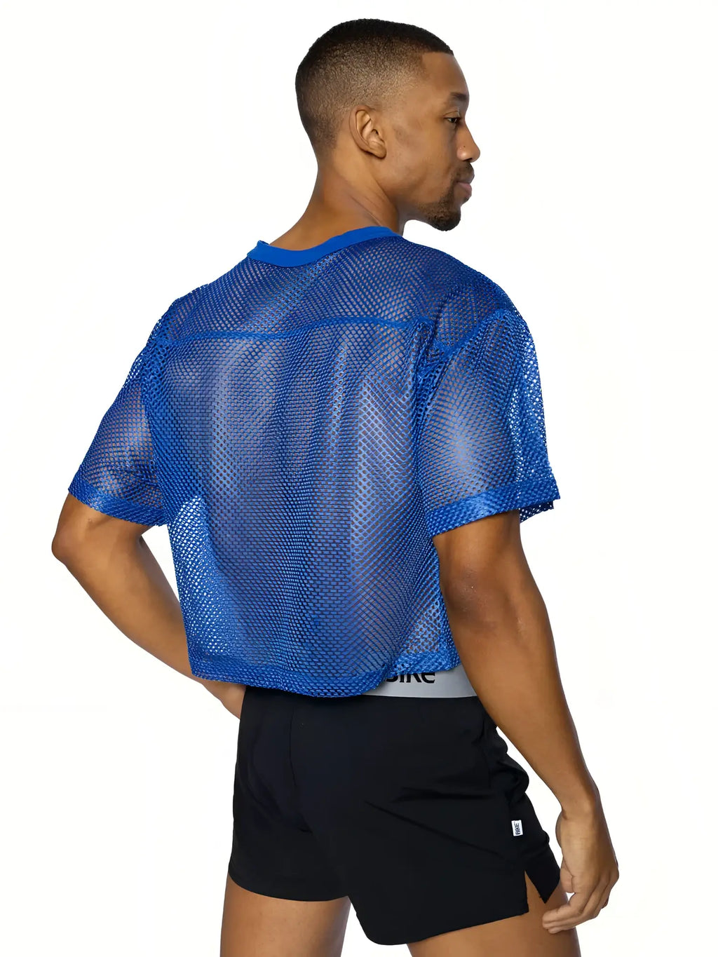 Blue mesh short-sleeved crop top with solid blue collar and hem from bike practice jersey collection