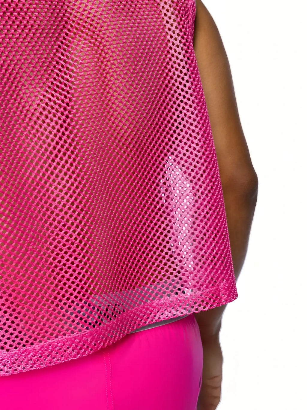 Bike sleeveless practice jersey in vibrant pink mesh with breathable sheer fabric and slightly flared hem