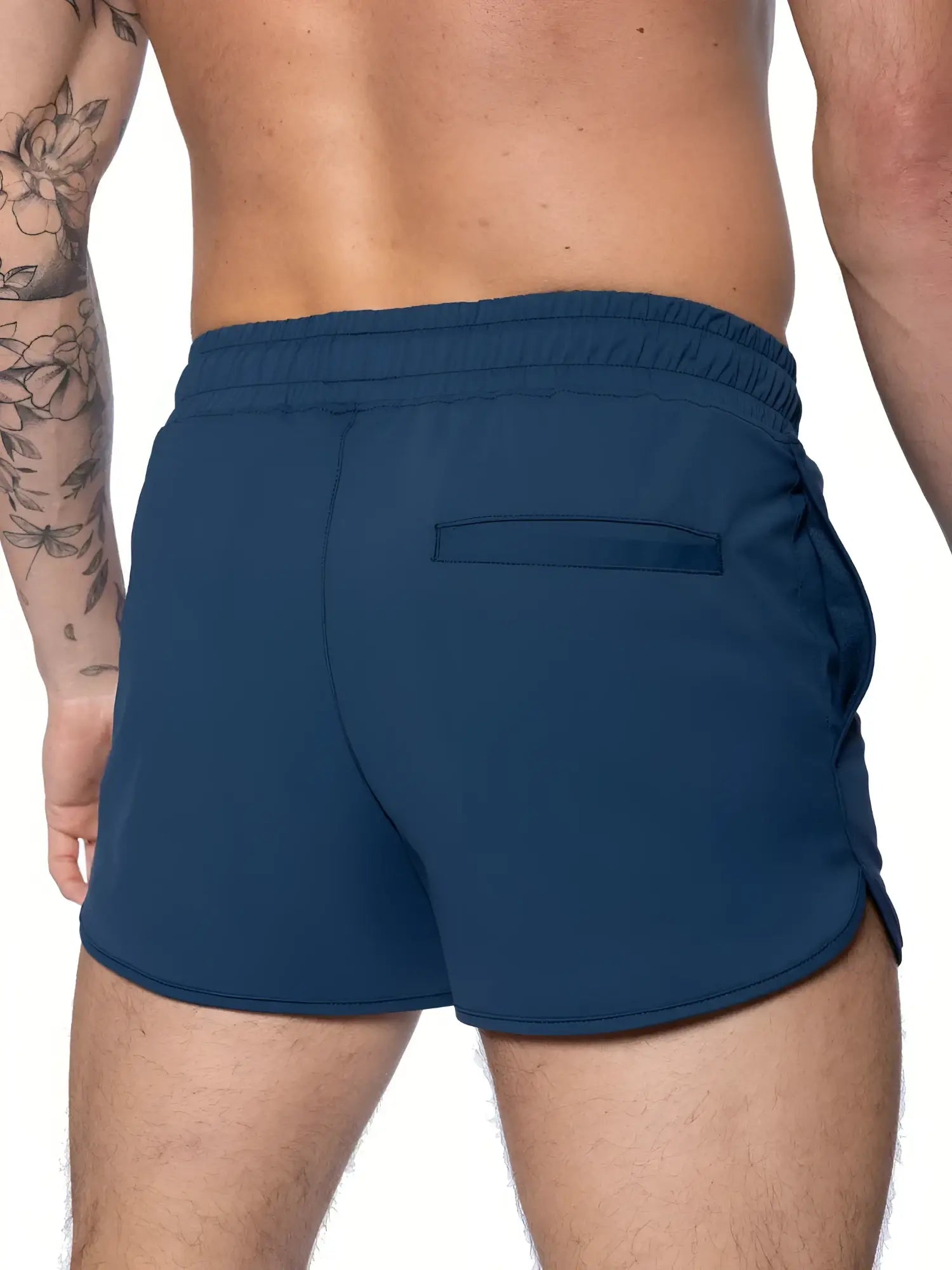 Navy blue Bike® Track Short athletic shorts with elastic waistband and single back pocket shown from the back side