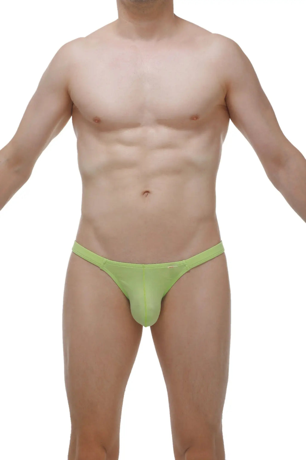 A lime green form-fitting thong made of smooth stretchy bamboo fabric shown from the back in bikini bessas bamboo apple green