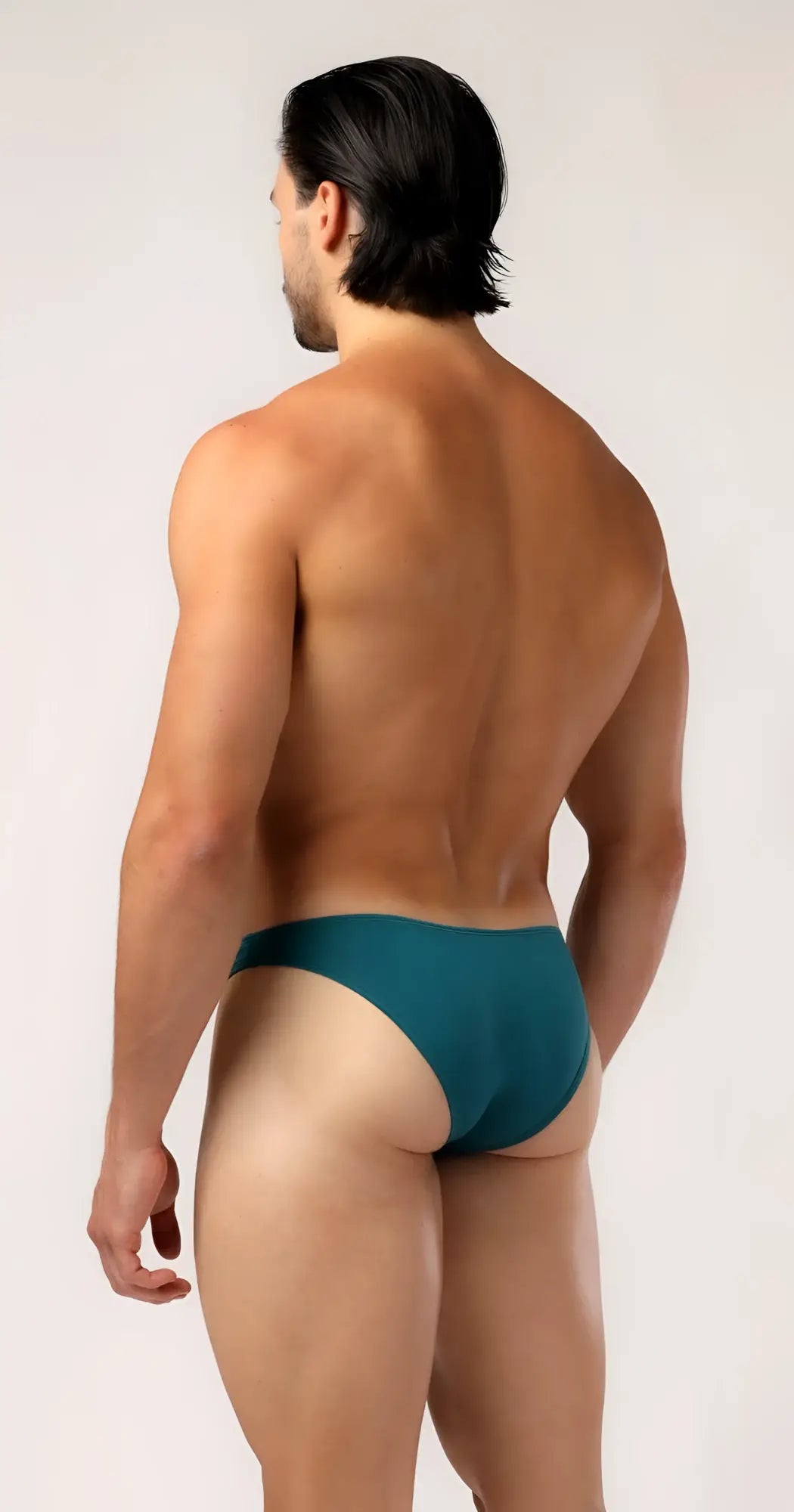 Teal-colored as bikini brief with smooth form-fitting design for comfortable everyday wear