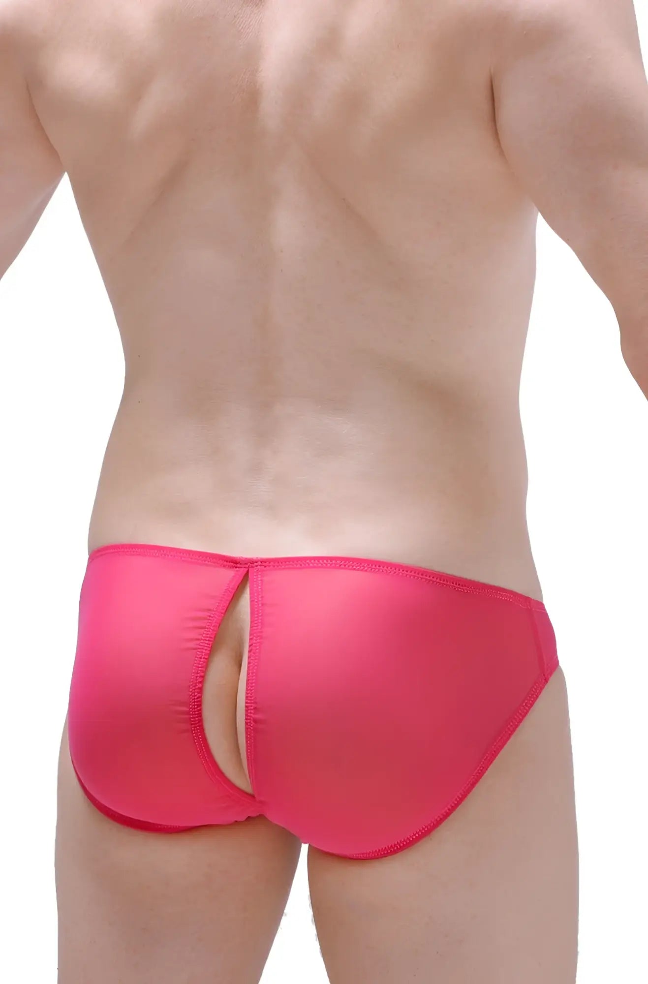 Bright pink bikini poncy net fuchsia sleek form-fitting swim trunks with central back cutout shown from the back