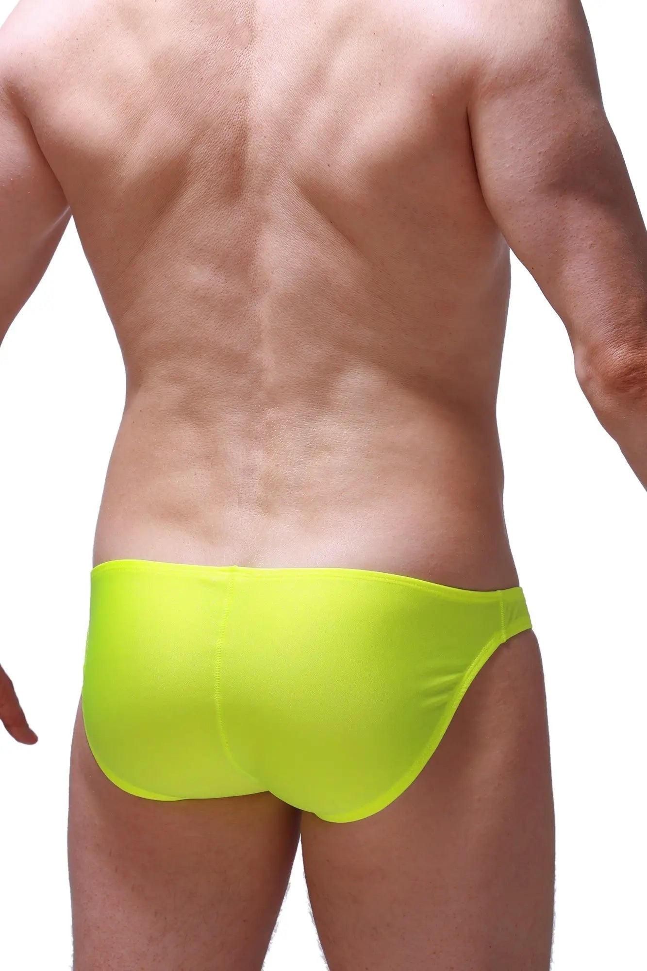 Bright neon yellow bikini taik joe swim trunks with smooth form-fitting fabric for comfortable beachwear