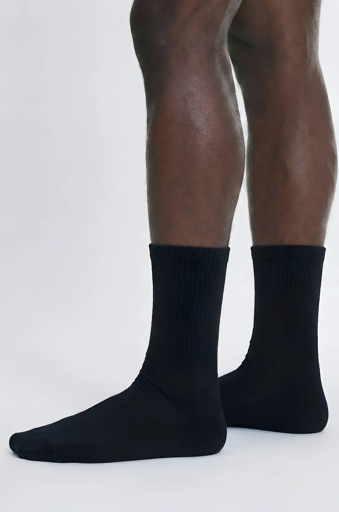Black caviar crew sock in black with ribbed cuff and smooth solid fabric for comfortable everyday wear