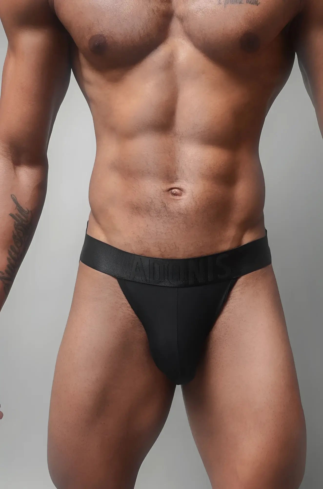 Black adidas black caviar dual jock briefs with smooth form-fitting design made for active wear
