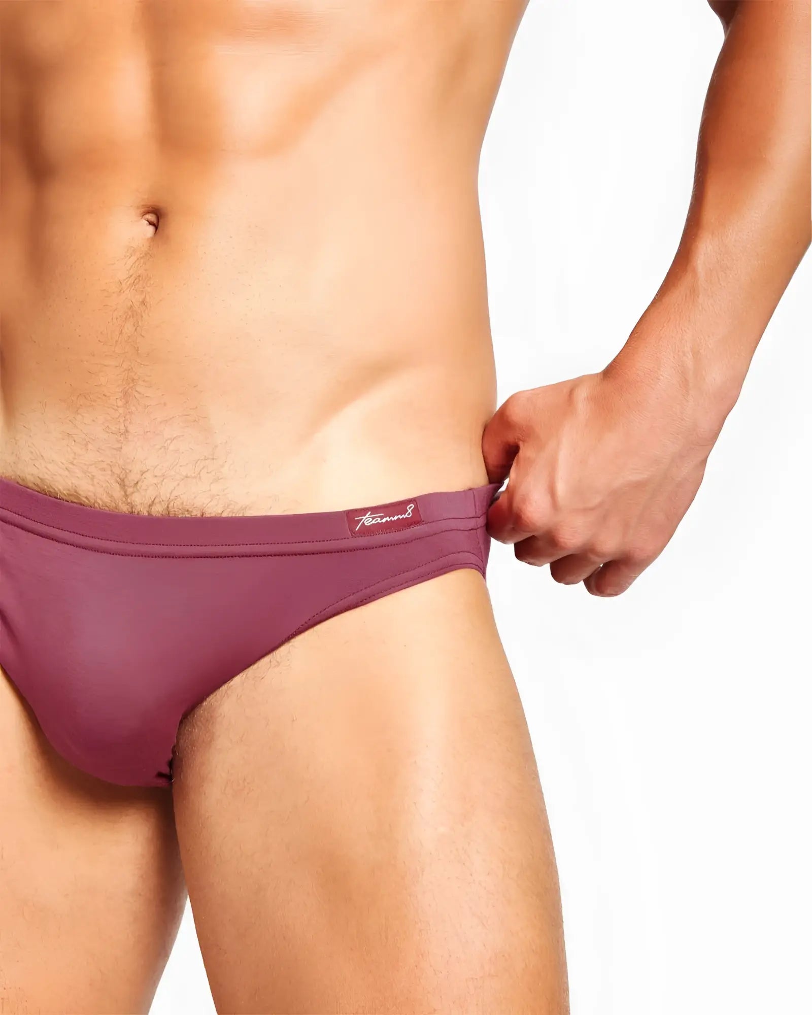 Purple men’s bamboo bikini briefs with a subtle brand logo on the waistband for comfortable everyday wear