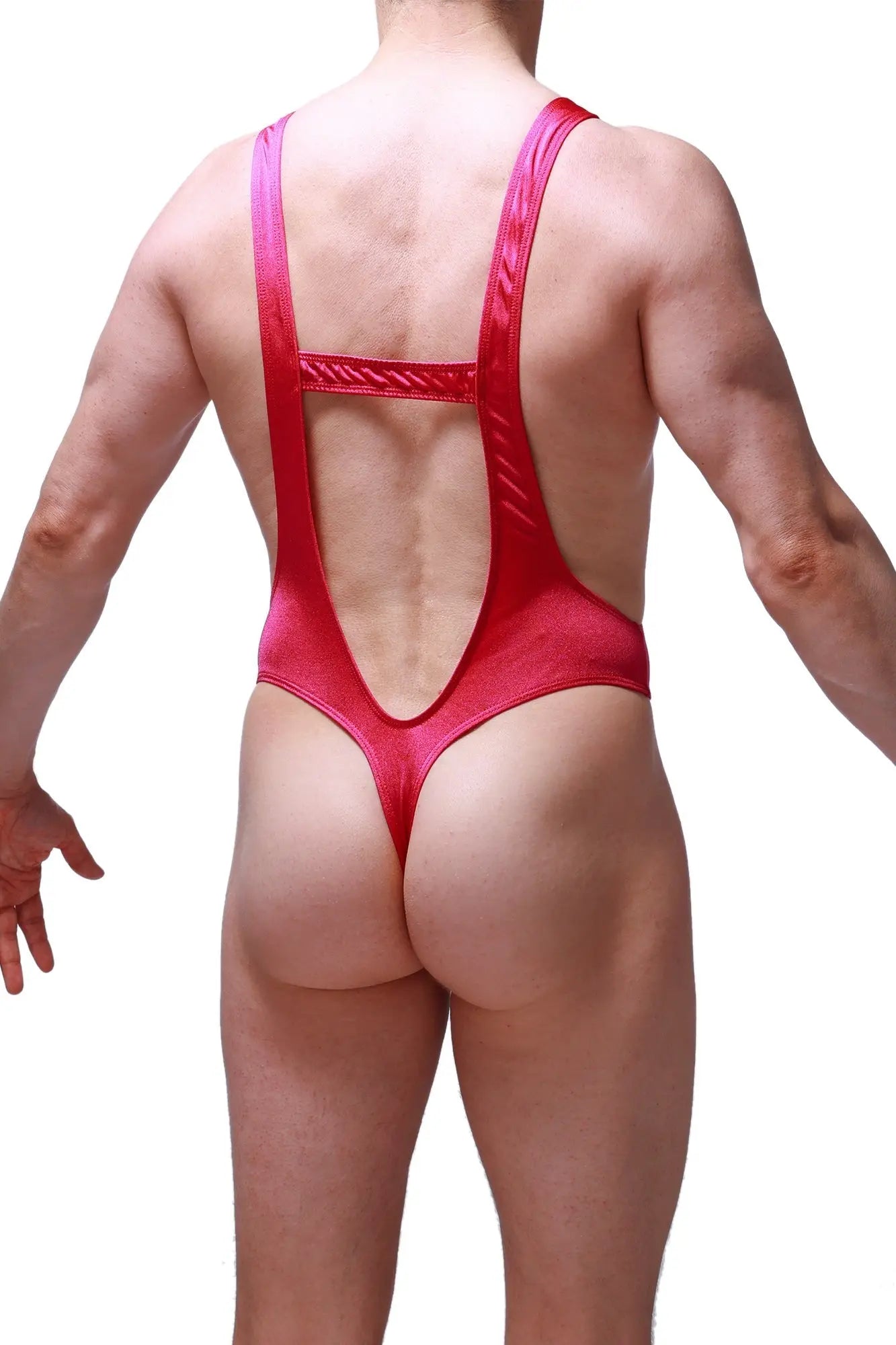 A vibrant red shiny bodysuit thong gonzac joe framboise with a cutout back and thin straps shown from the back side